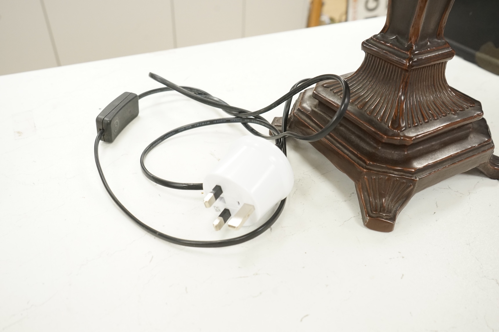 A bronze-effect Tiffany style leaded table lamp, 67cm high
